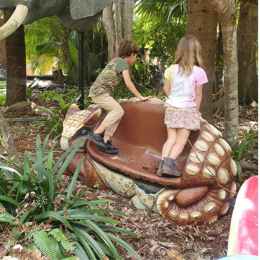 Natureworks Australia Ankylosaurus Seat- 170121-shown outside with children