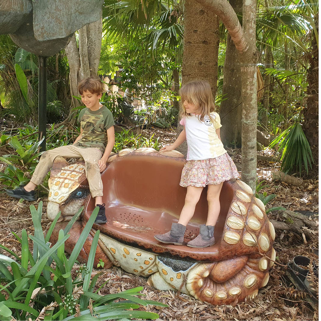 Natureworks Australia Ankylosaurus Seat- 170121-shown outside with children