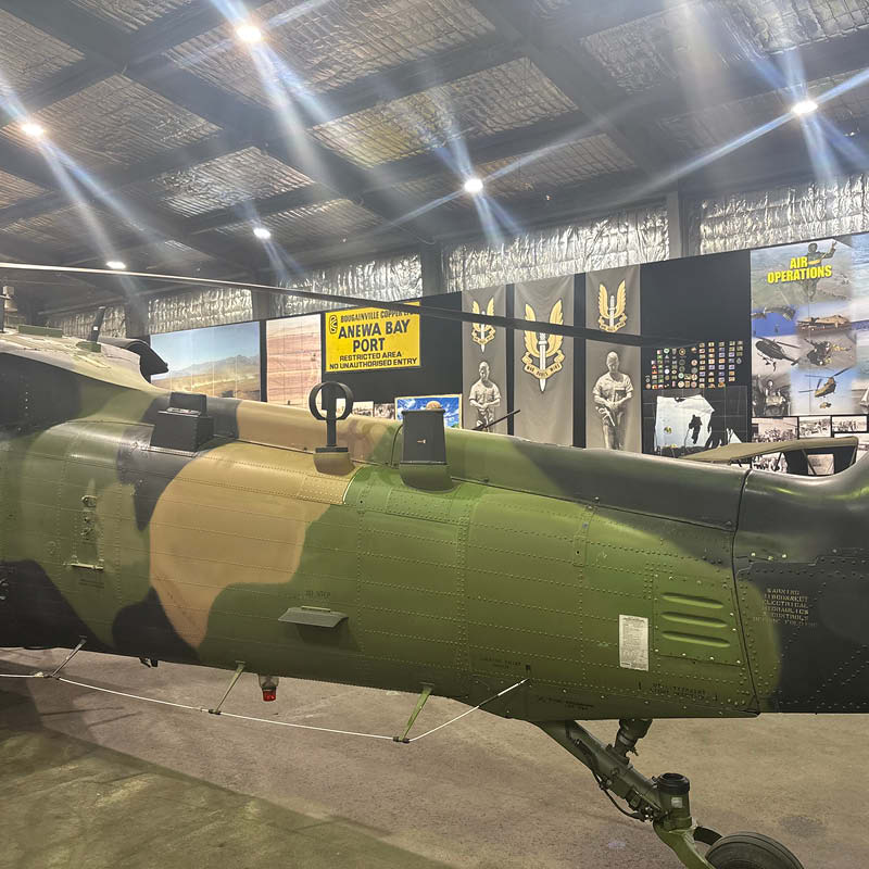 Natureworks Australia Black Hawk helicopter - shown in aircraft hanger- tail end view-V7