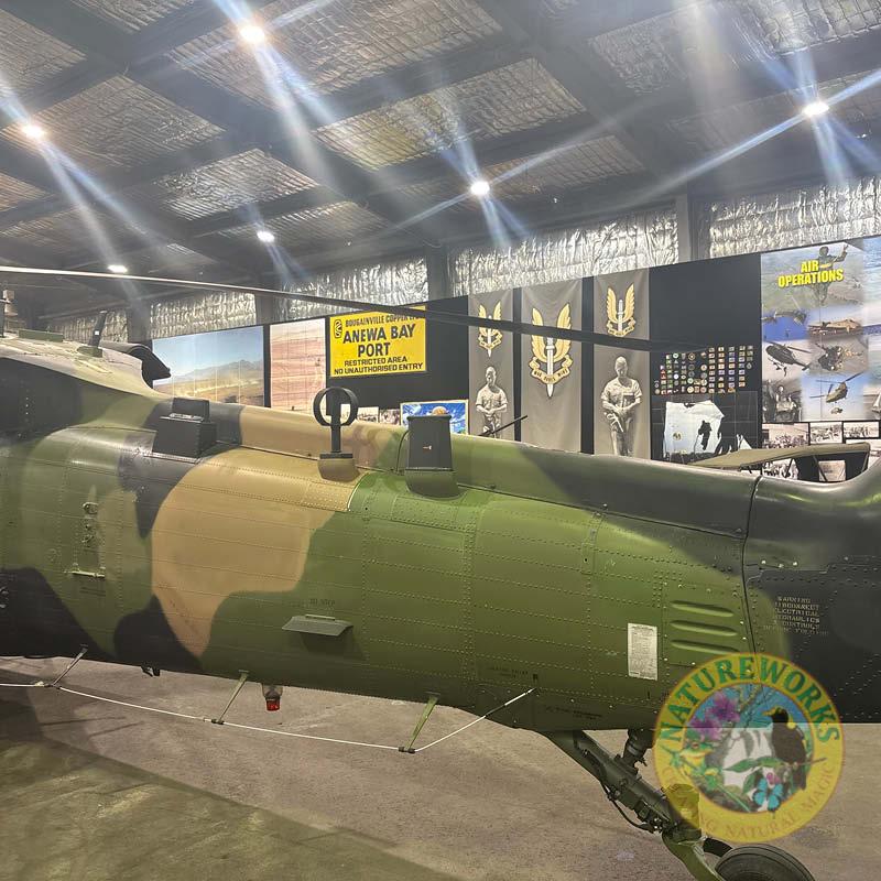 Natureworks Australia Black Hawk helicopter - shown in aircraft hanger- tail end view-V7