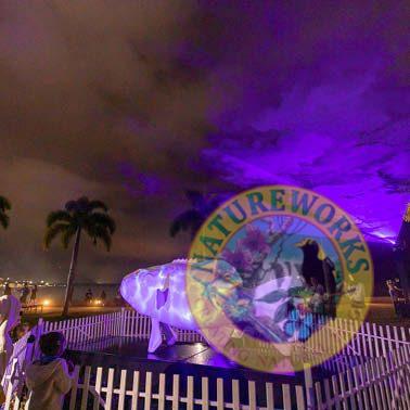 Natureworks Australia Coral Trout - White - Giant for public art displays and events - 120045White - showin with colour laser light shining on display - in Cairns Queensland - showin in exhibit with purple lights