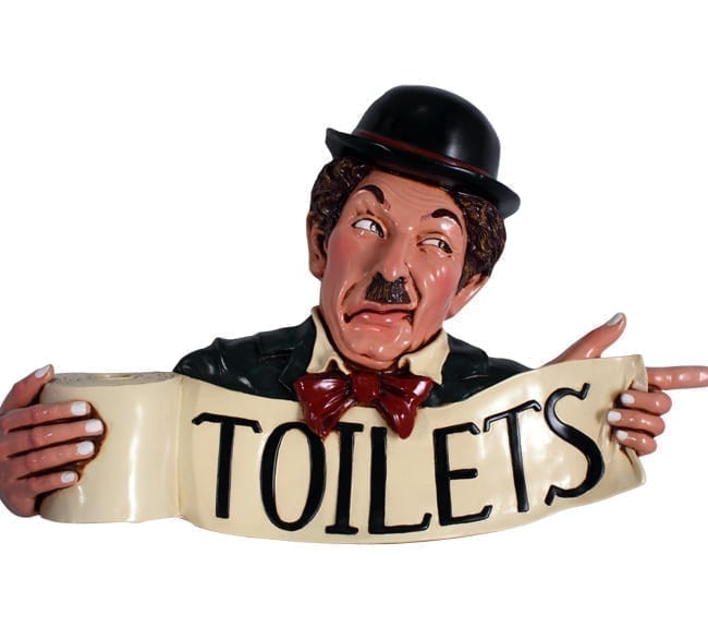 Comedian with Toliet Sign