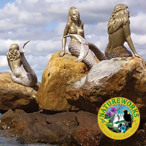 Daydream Island Mermaids on rock