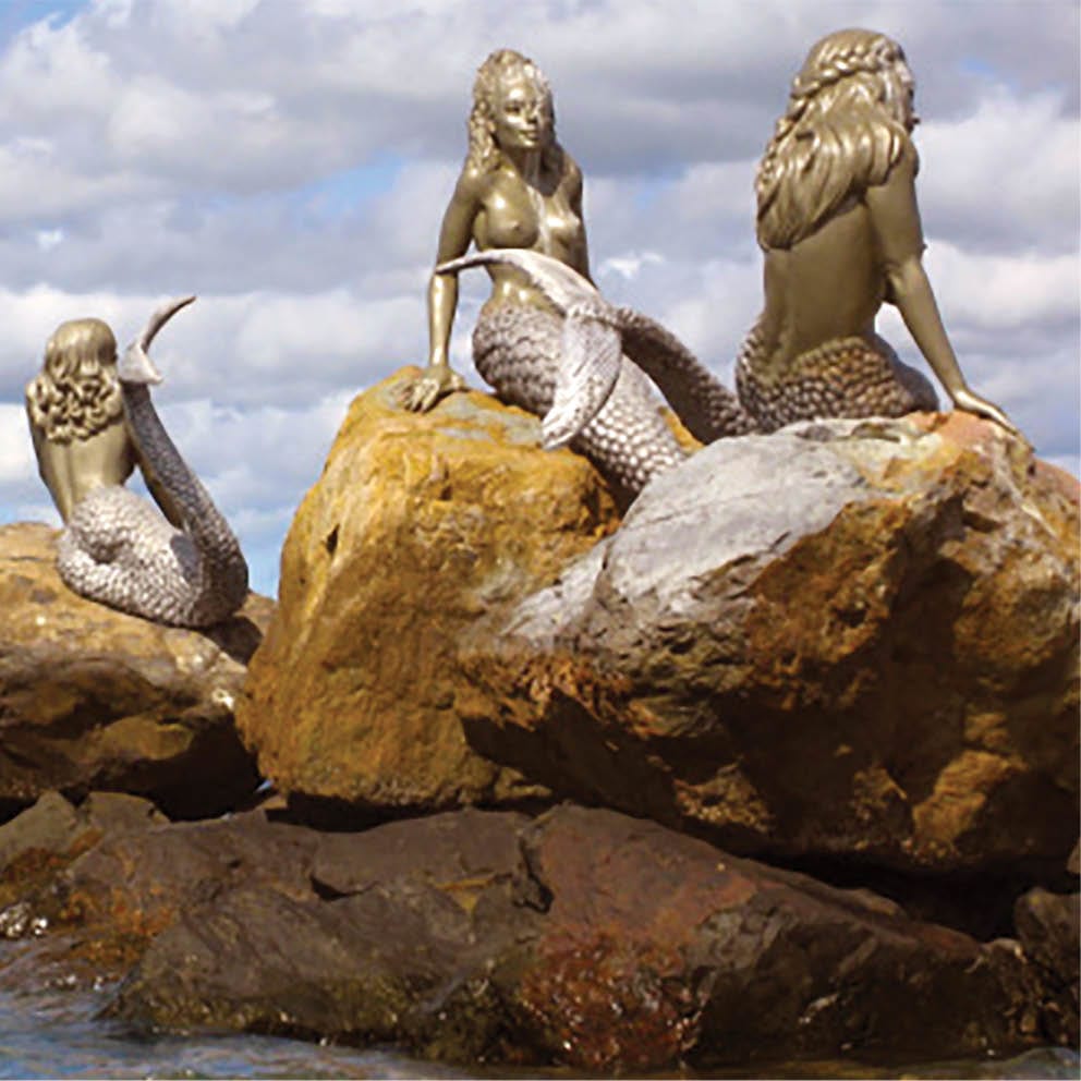 Natureworks Australia Daydream Island Mermaids on rock