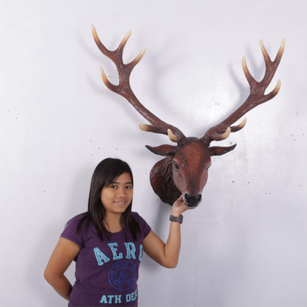 Deer stag head - Wall mount - red - sku 130095 - shown with lady mounted on wall for size comparison