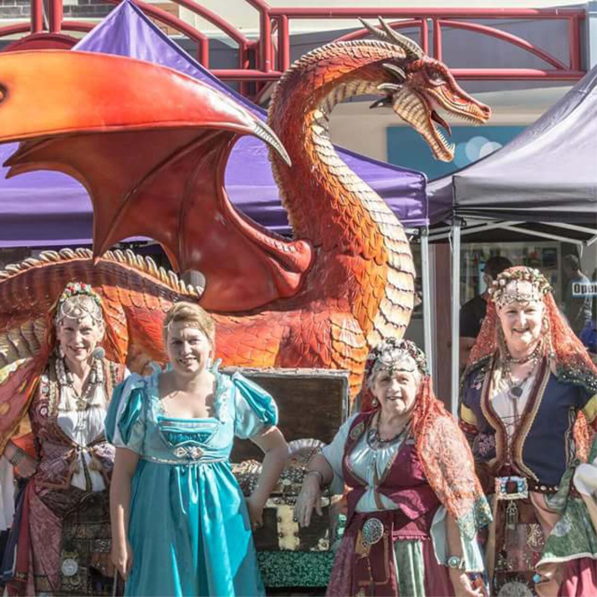 Natureworks Australia Dragon STanding - 7ft Red - 100043- shown on float at medieval festival