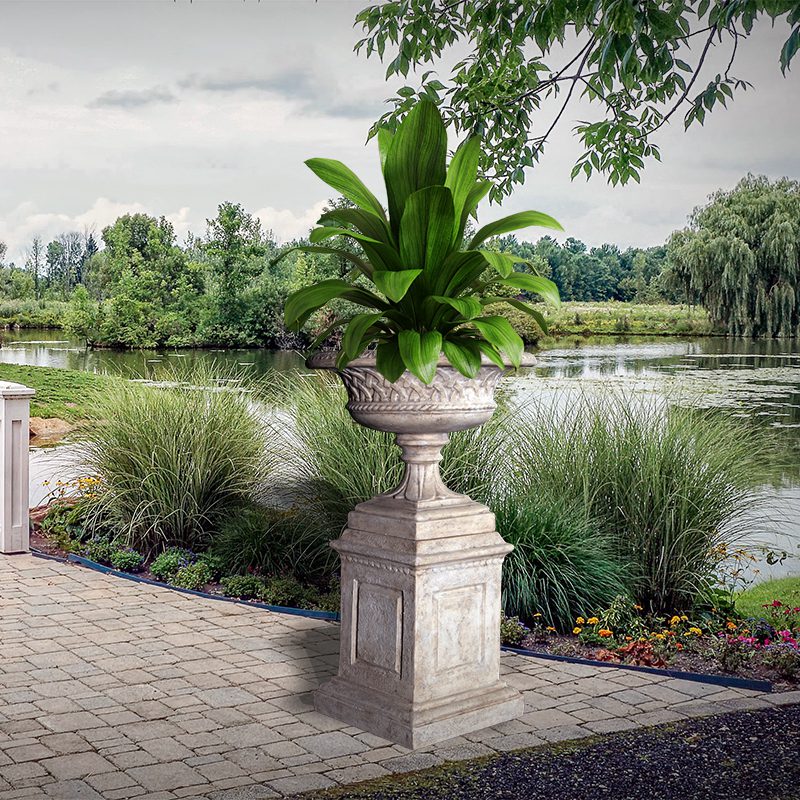 Natureworks Australia Eastwell urn on Base - Showin in outdoor setting