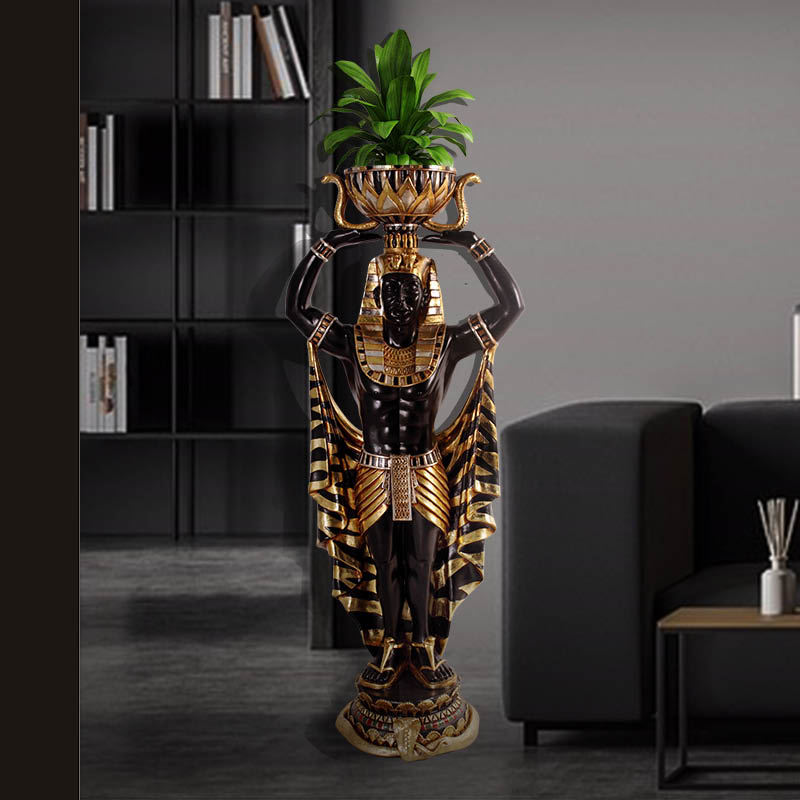Natureworks Australia Egyptian_Planter_Holder_Male_4ft_PLEM4- shown in decor setting. Gold leaf and black