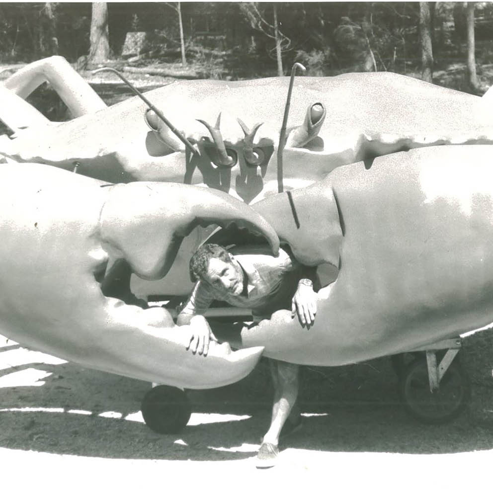 Giant Crab On Post Cardwell Black and White photo with young guy before installation