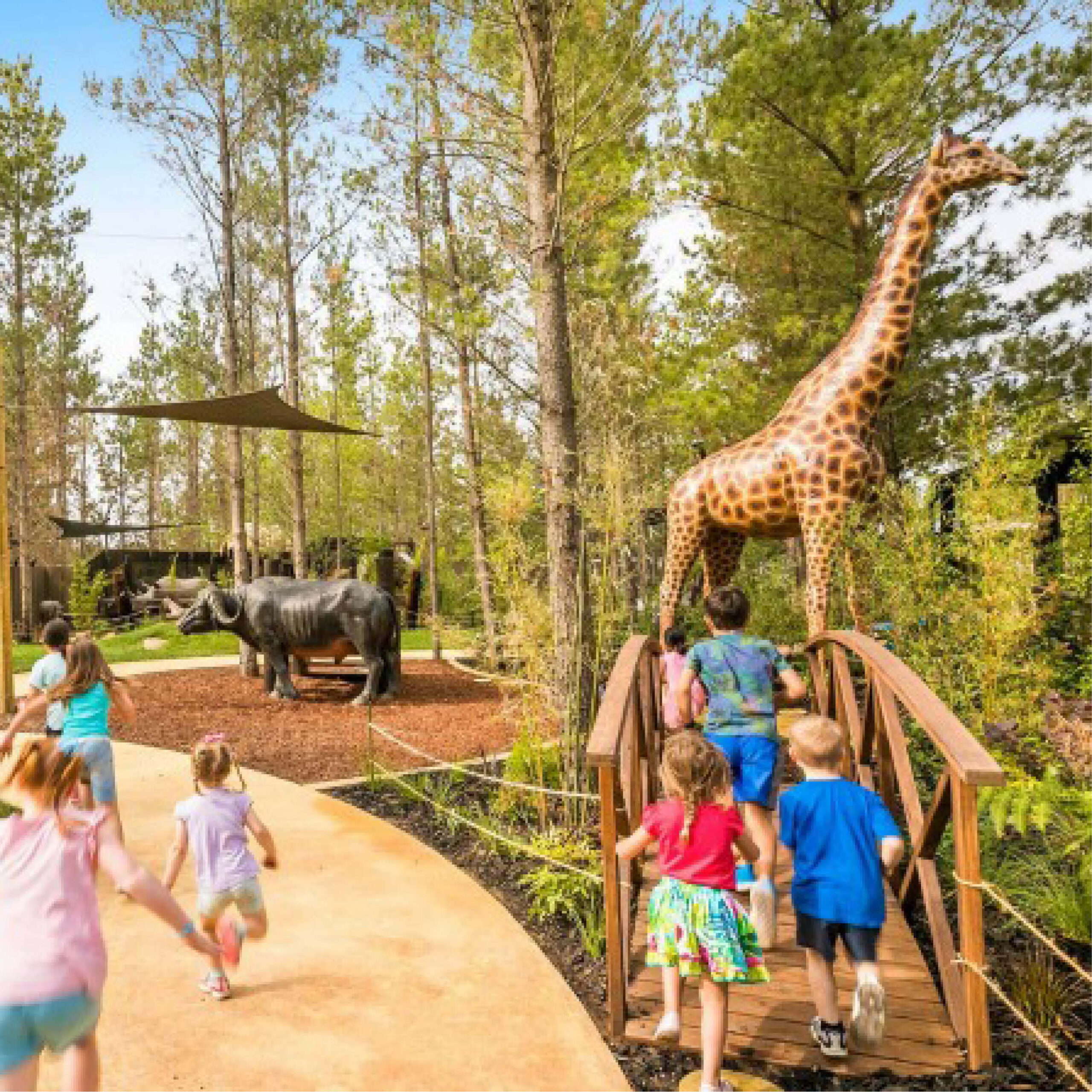 Natureworks Australia Giraffe-18ft-side view-shown displayed in playground with children-140039