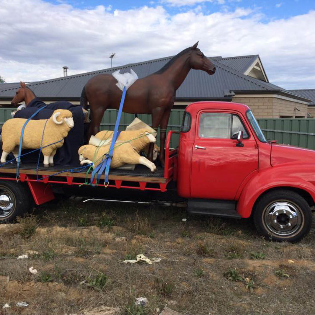 Natureworks Australia Natureworks Horse statue 7ft - 100019 - painted chestnut - shown o back of a truck ready to be delivered to customer