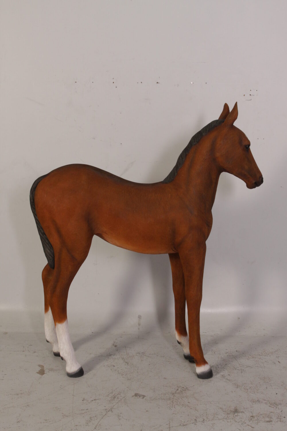 Horse Foal standing - 120043 Brown - shown with life-size horse standing - side view