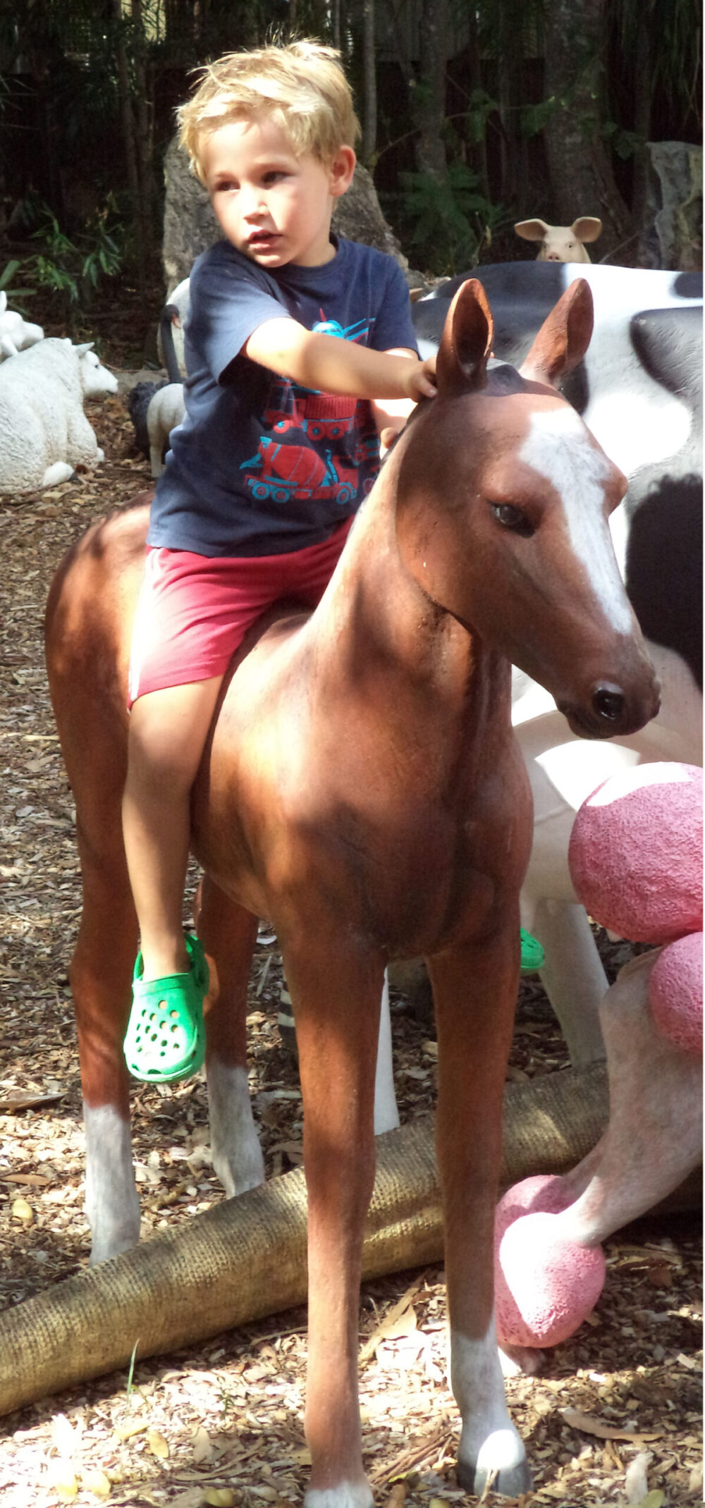 Horse Foal standing - 120043 Brown - shown with little boy sitting on top