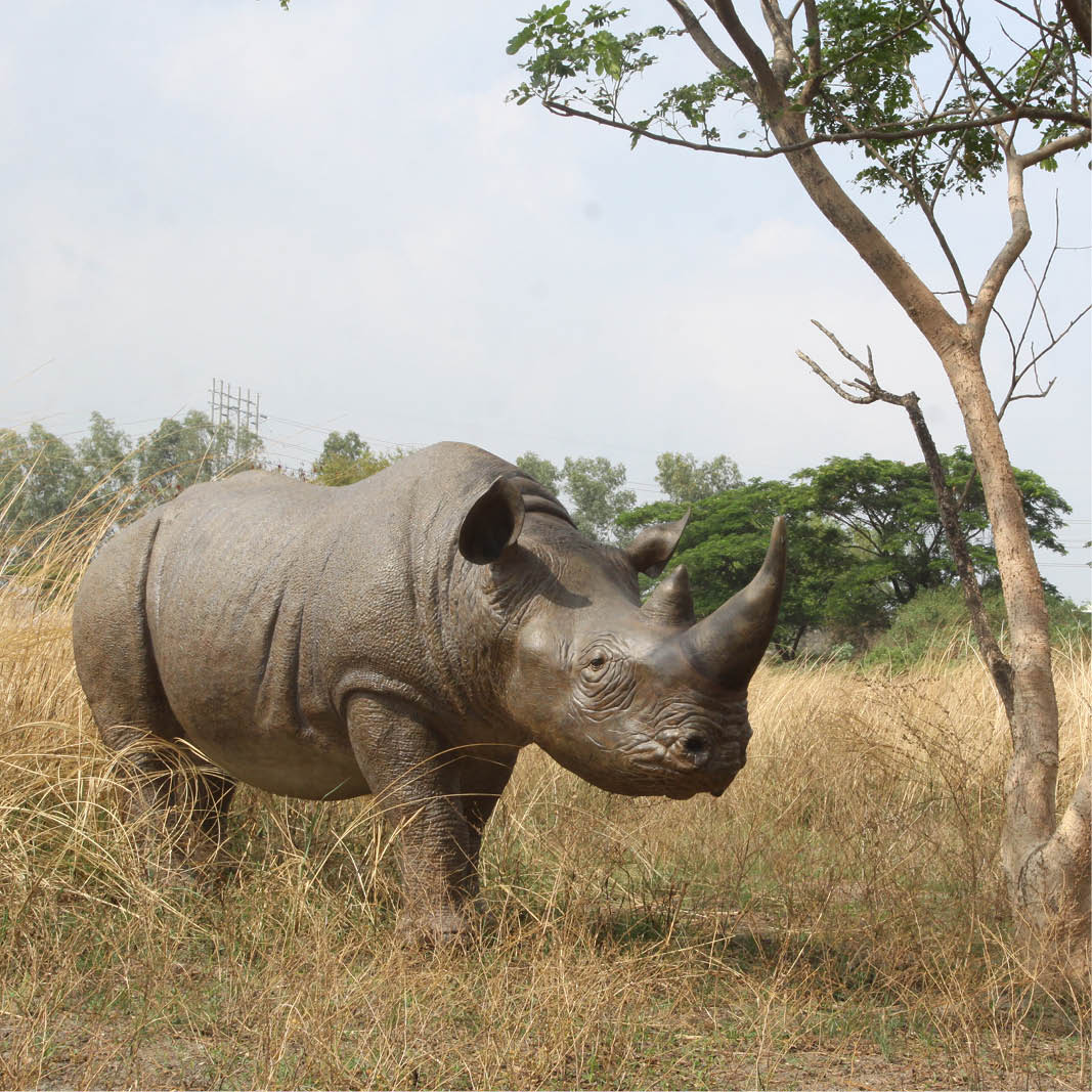 Natureworks Australia Natureworks Rhino statue - Angle view - shown outside140042