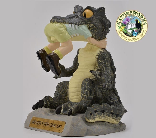 Never Ever Give Up Figurine With Crocodile eating someone