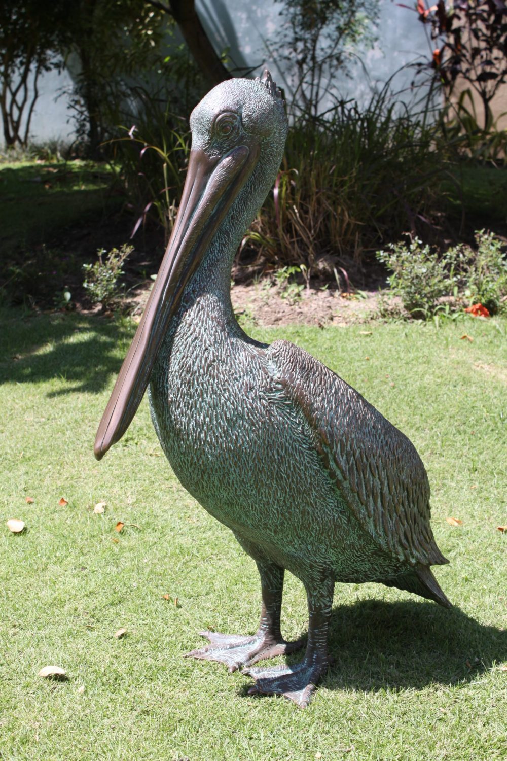 Pelican standing - with a greenish bronze finish