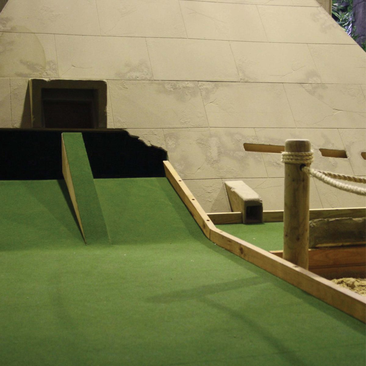 Natureworks Australia Pyramid - 7m Base - Shown in mini-golf course-as a putt through prop