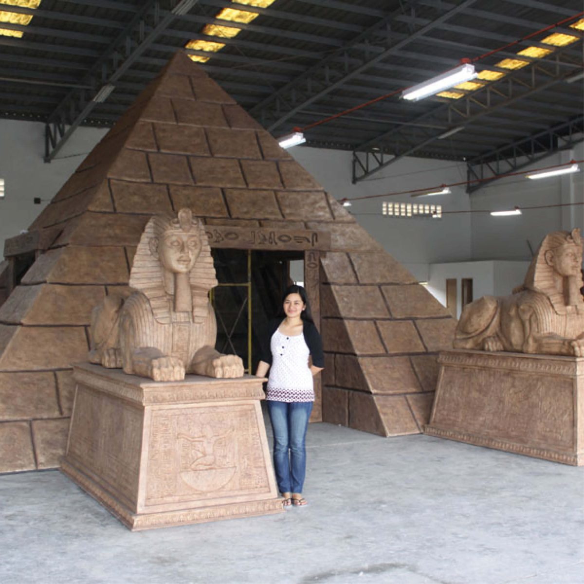 Natureworks Australia Pyramid - 7 metre base. Showning - completed with Sphiin complete structure with lady