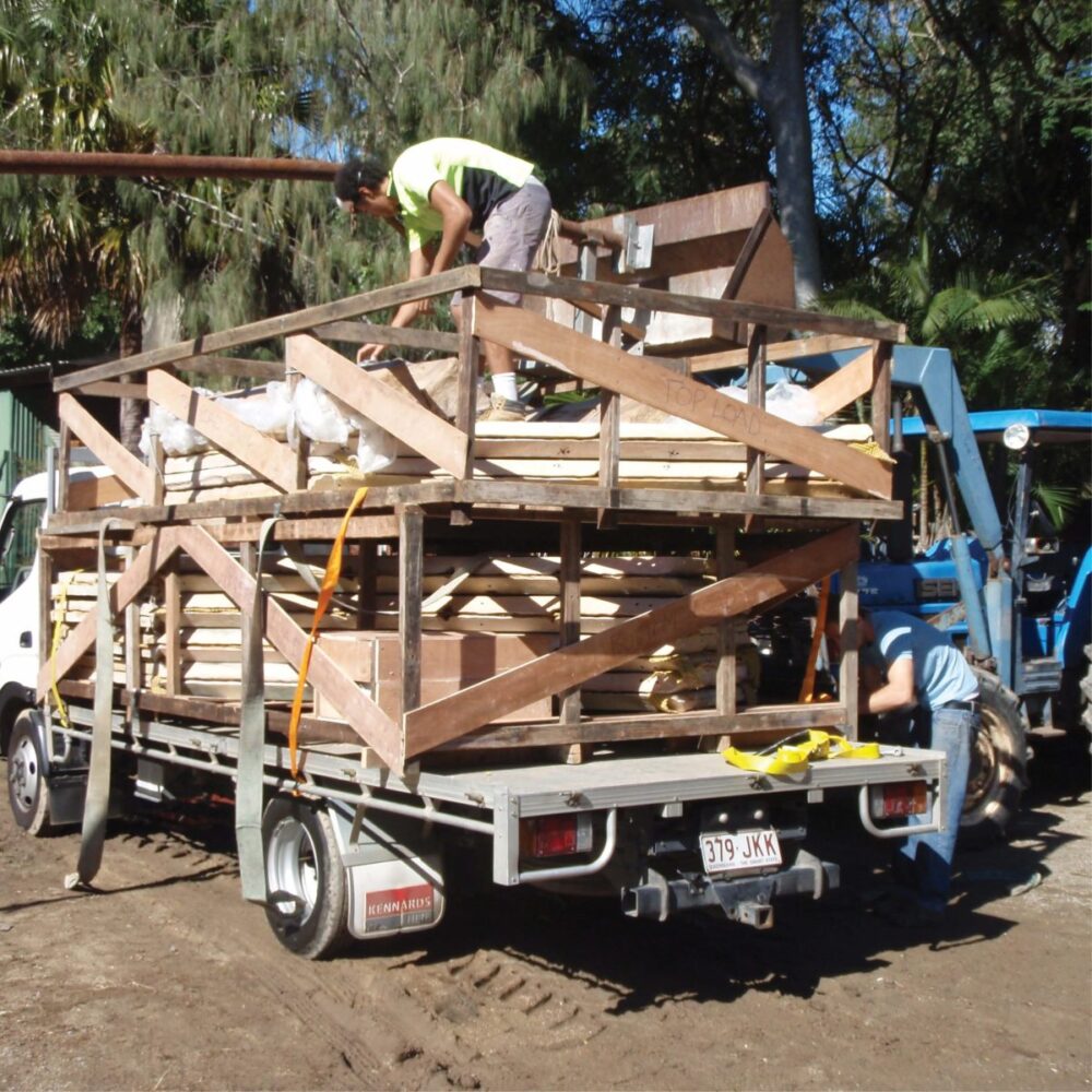 Pyramid kit panels - loading on truck showing 2 tiers of panels and crate