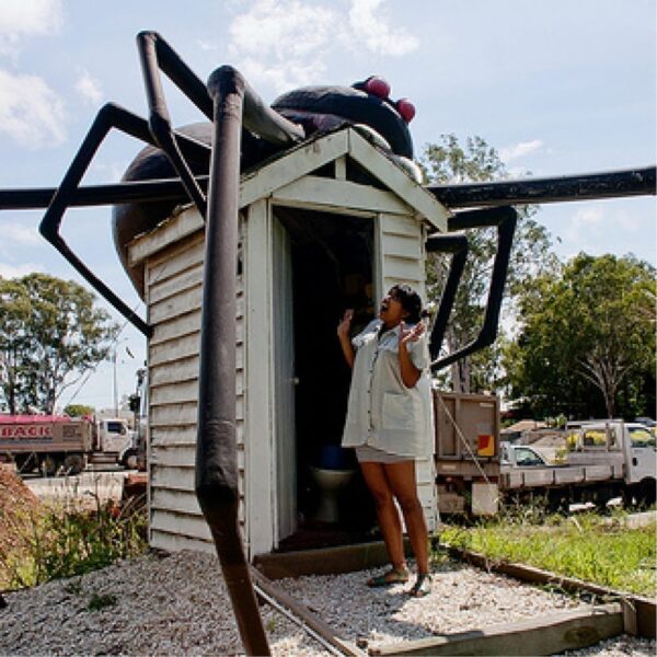 Redback Spider Giant with scared lady