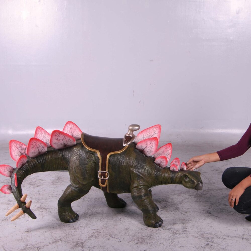 Stegosaurus Definitive Dinosaur with Sadd;e - 150077 with lady