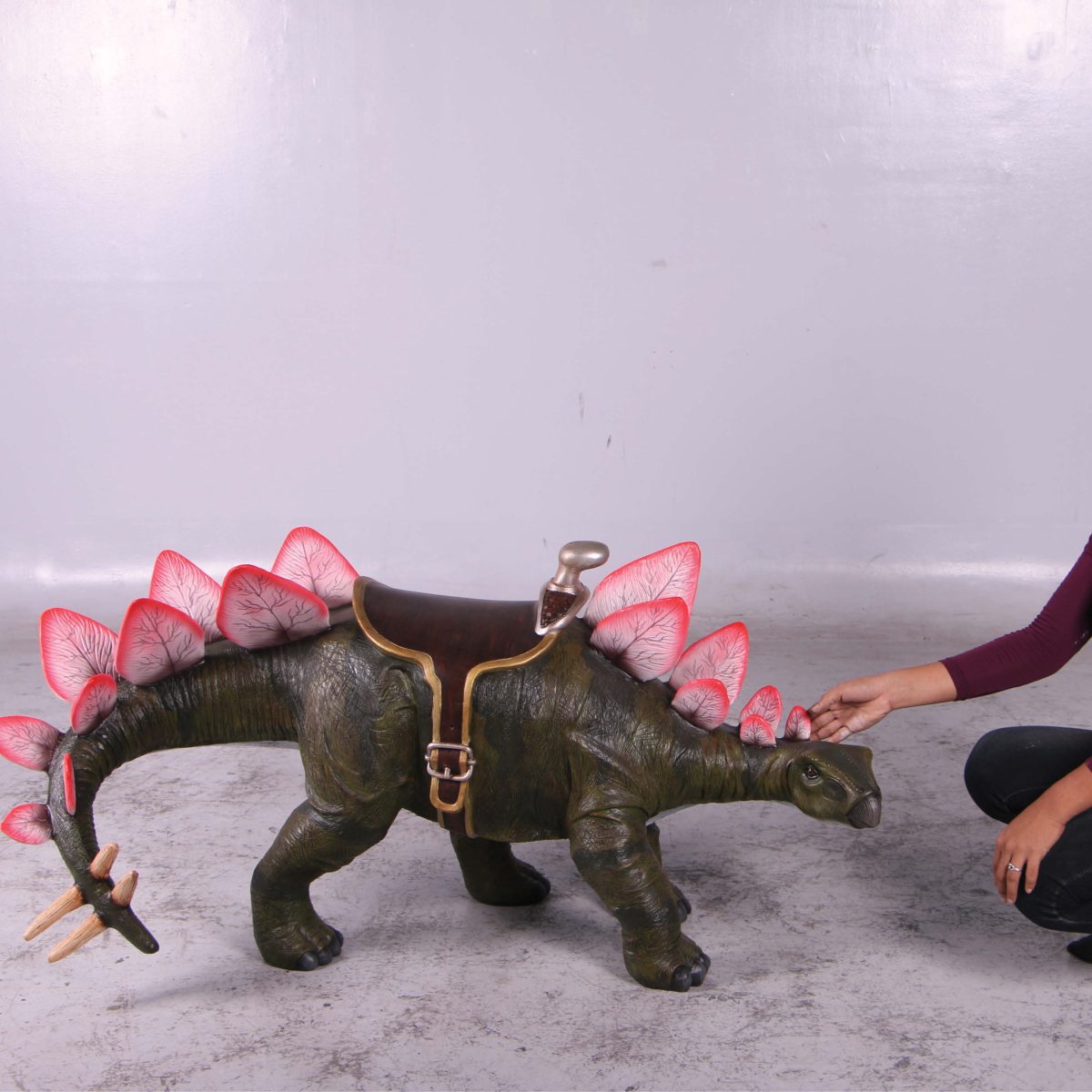 Natureworks Australia Stegosaurus Definitive Dinosaur with Sadd;e - 150077 with lady