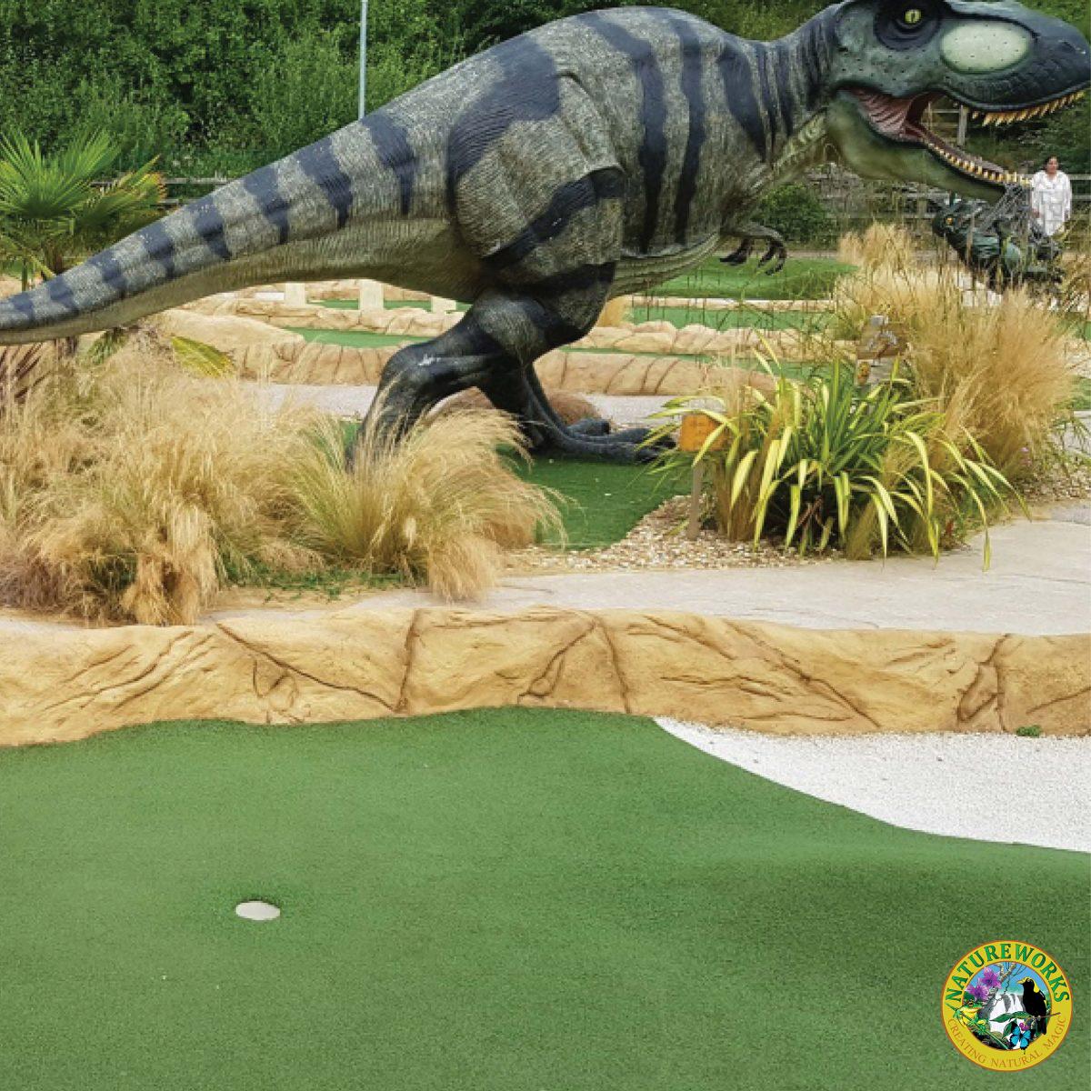 Natureworks Australia Tyrannosaurus Rex Dinosaur Walking - Shown- in mini-golf course