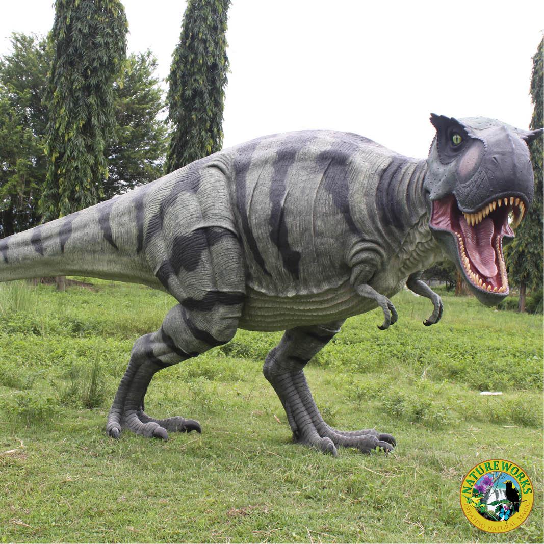Natureworks Australia Tyrannosaurus Rex also T-Rex dinosaur statue - 110073- shown outdoors