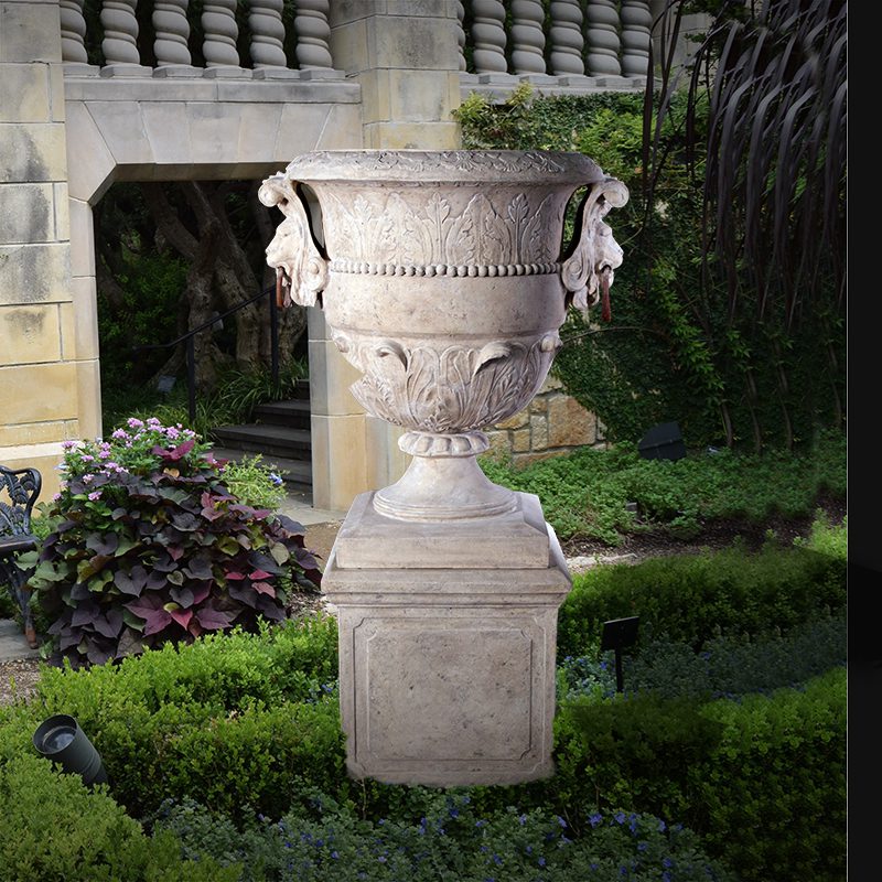 Natureworks Australia Natureworks Large - Urn with lion handles and includes a base plinth - 050701RS - displayed outside in grden