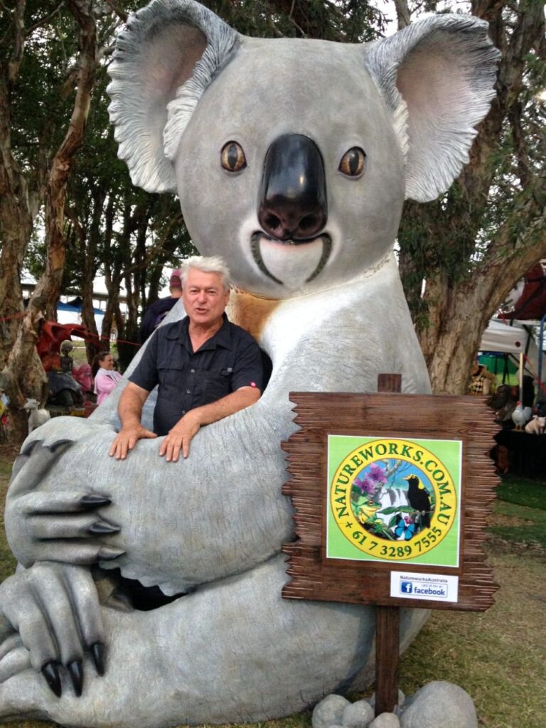 koala cuddle david sculpture -