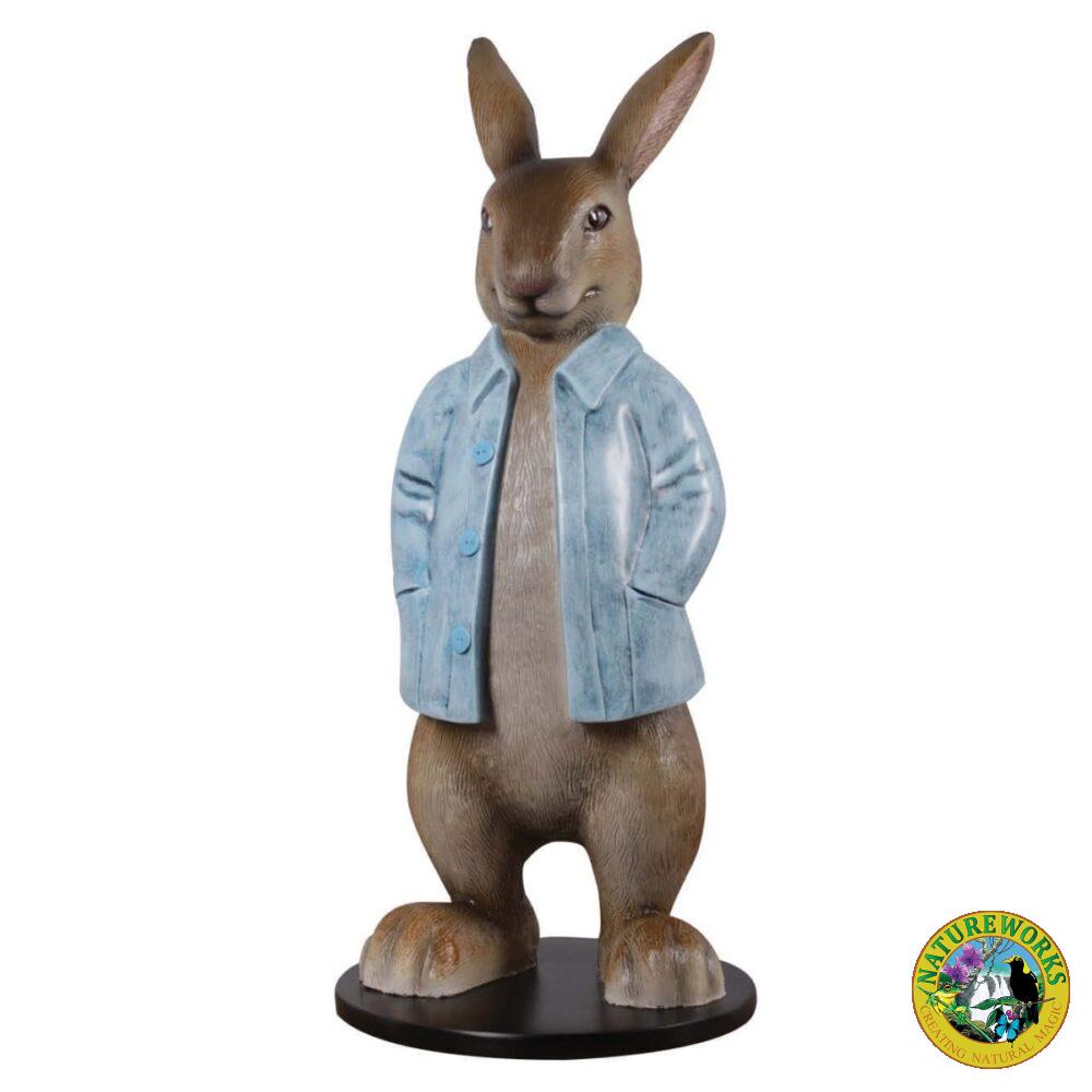 Rabbit statue with a blue coat