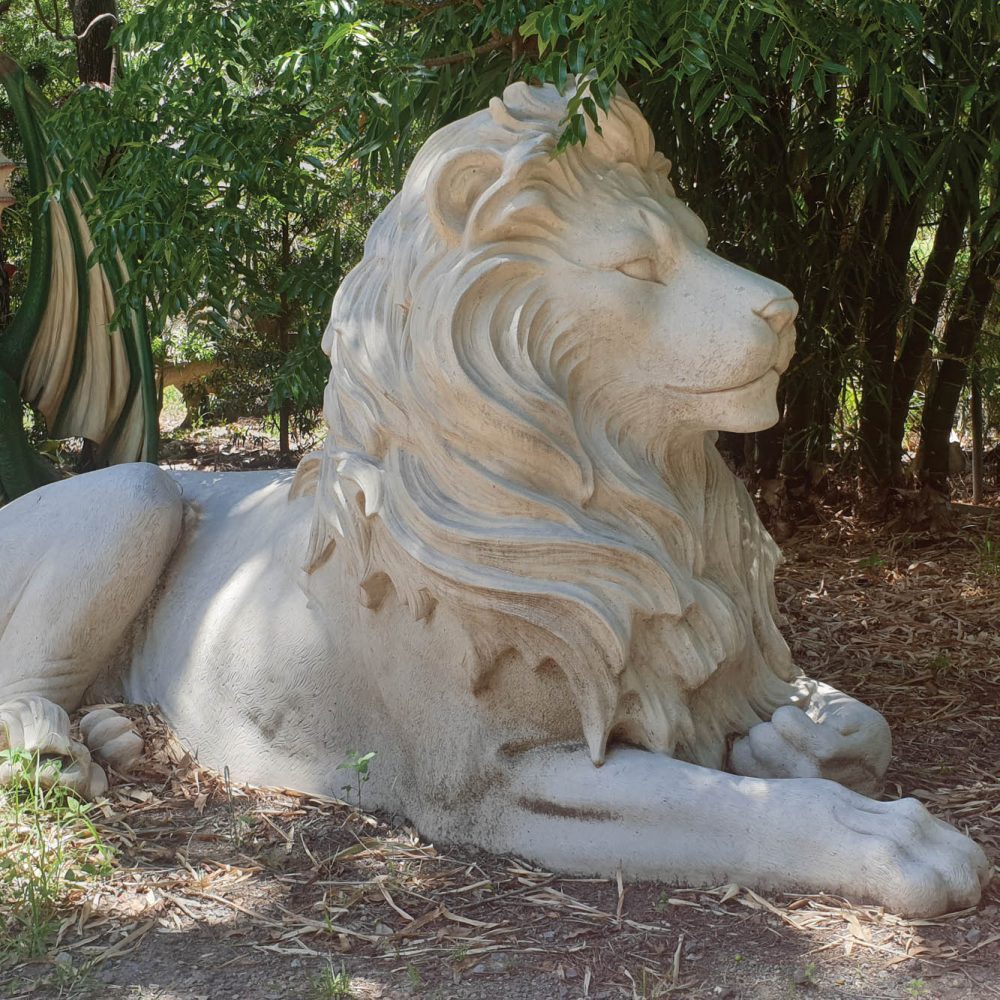 Lion Statue in resting pose - Majestic castle Roman Stone