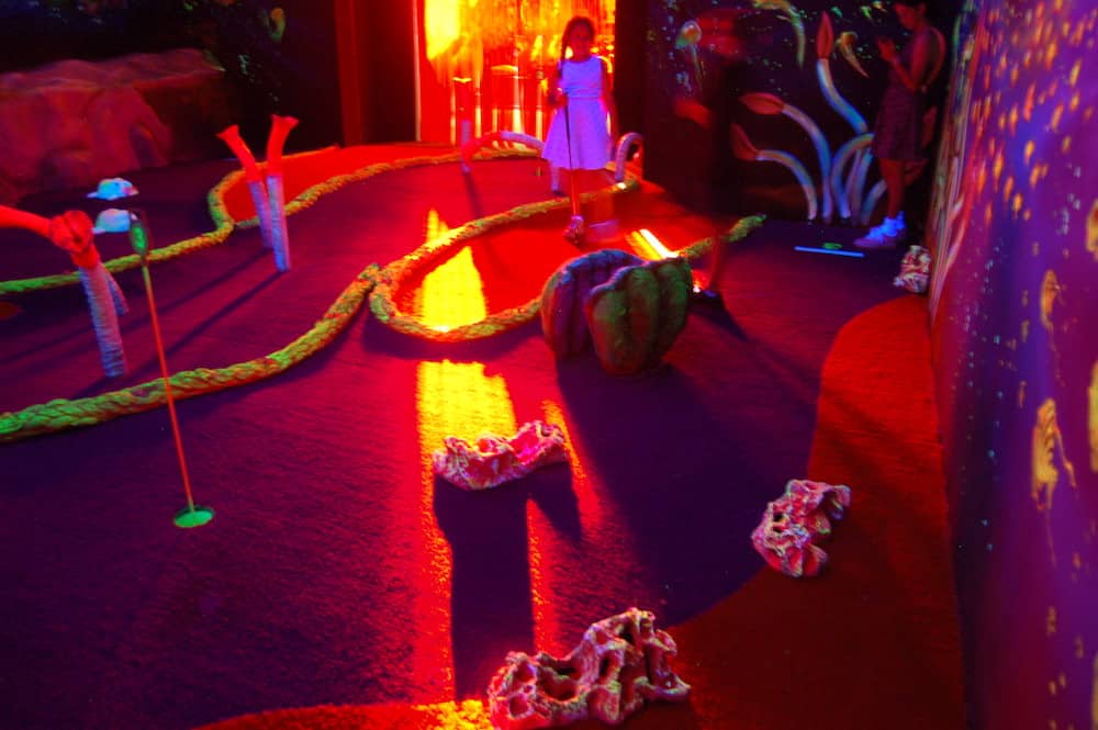 Glow-in-the-dark mini golf at Undersea putt and Play Redcliffe
