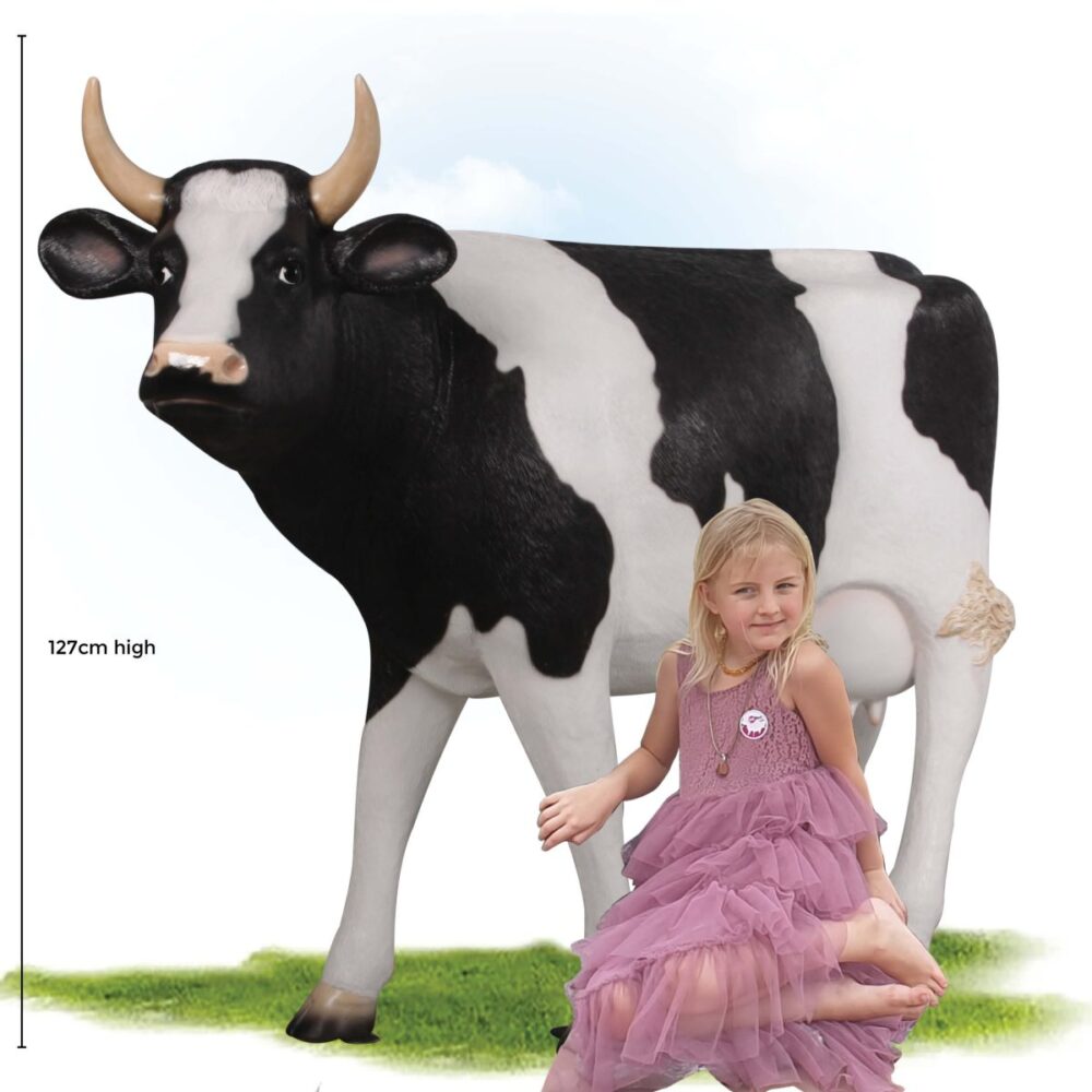 Cow Standing - Friesian 114cm with girl sitting in pink dress
