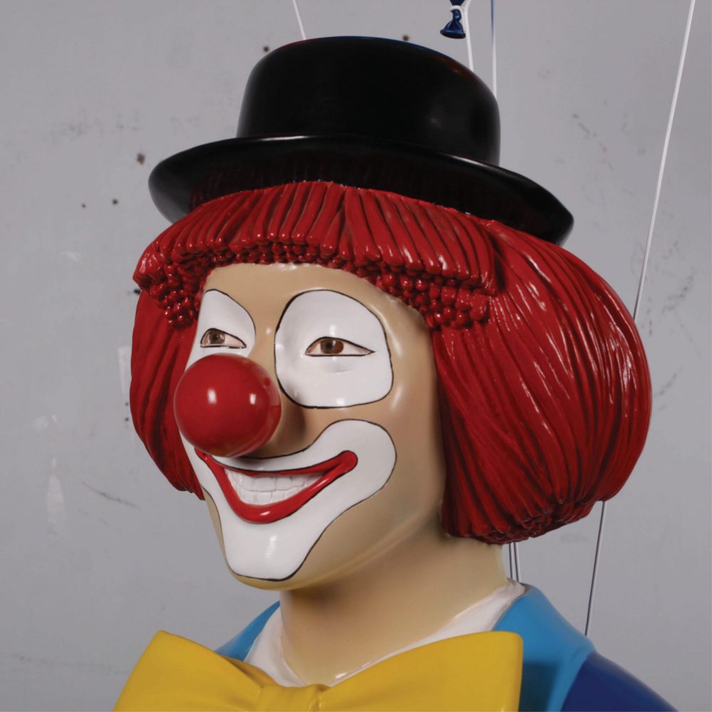 Friendly Clown statue with umbrella and baloons