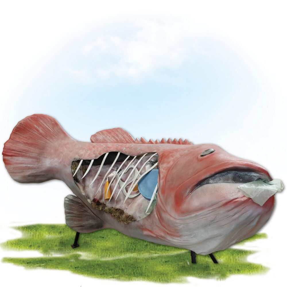 Fish 3m long with pollution debris- on display stand