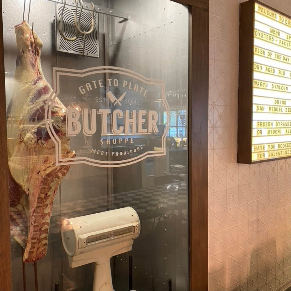 Side of beef - shown in a restaurant glass display cabinet- realistic reproduction.