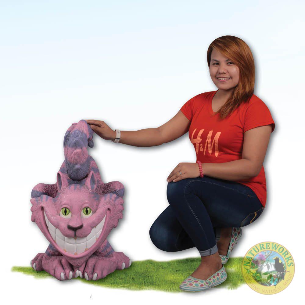Natureworks Australia Cheshsire Cat Statue - Photo- Alice in wonderland prop - shown with lady