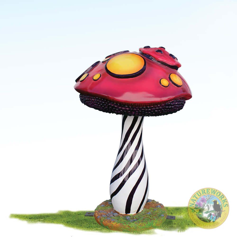 Mushroom with striped base and red top with yellow dots - unusual fantasy themed prop