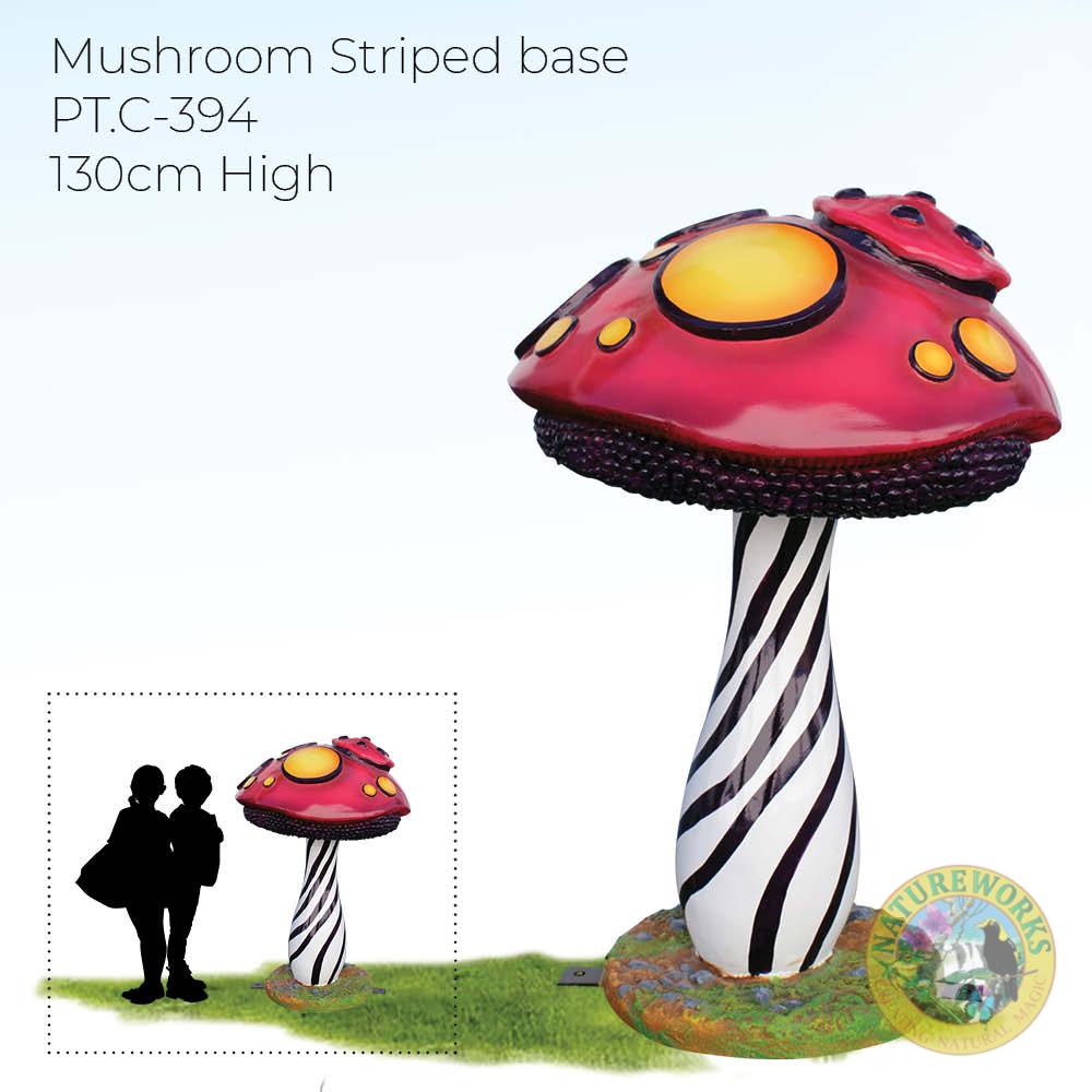Natureworks Australia Mushroom with striped base and red top with yellow dots - unusual fantasy themed prop photo