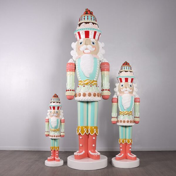pastel candy nutcracker sculpture with cake hat