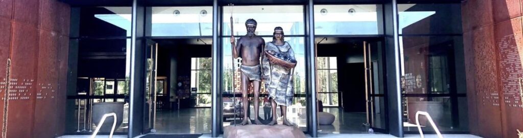 Murrook Culture Centre entrance with aboriginal warrior statues