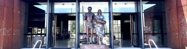 Murrook Culture Centre entrance with aboriginal warrior statues