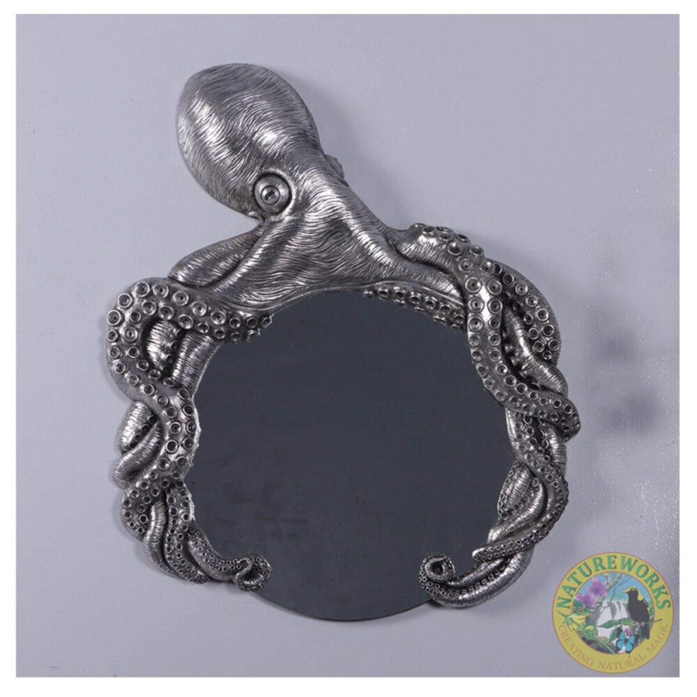 Octo Mirror SKU 210014SL - a beautiful original handcrafted octopus mirror - shown on wall - front view- size L69cm x W 7.6cm x H 84cm -7kg - Silverleaf finish