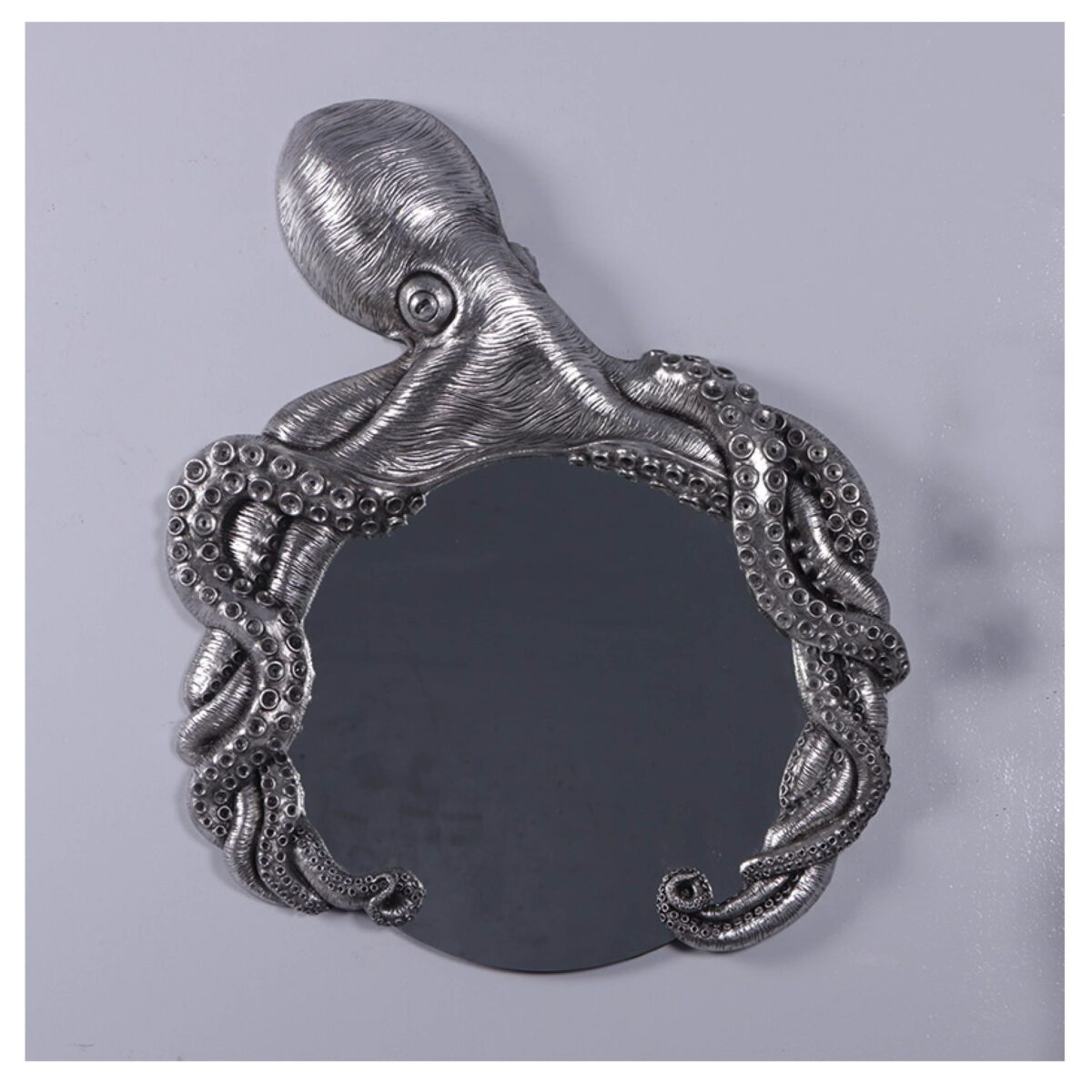Natureworks Australia Octo Mirror SKU 210014SL - a beautiful original handcrafted octopus mirror - shown on wall - front view- size L69cm x W 7.6cm x H 84cm -7kg - Silverleaf finish