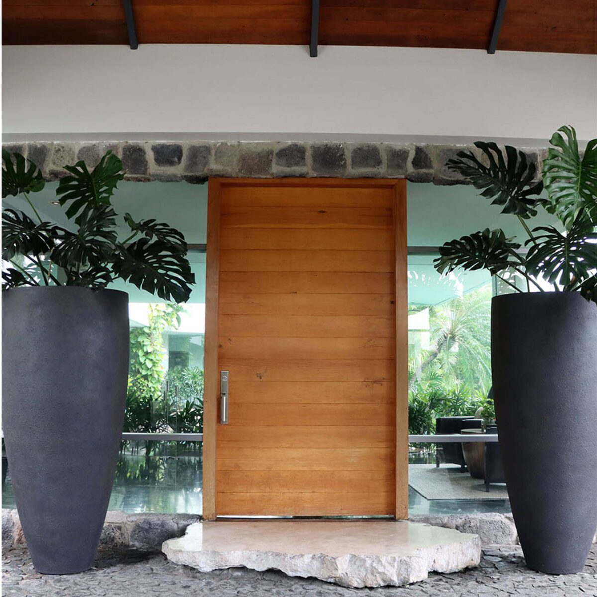 Natureworks Australia Flora Grande Planter - 6ft - 230121Matt Black- shown at front of house entrance