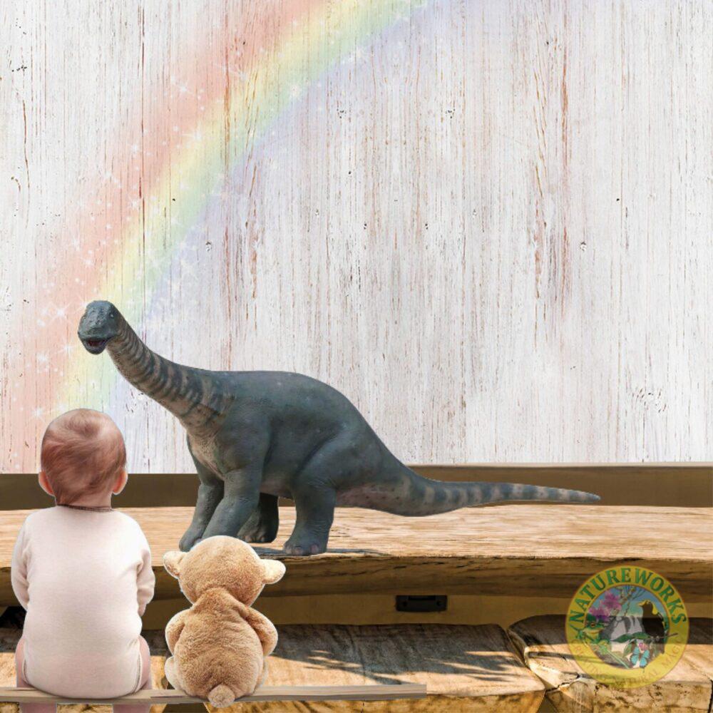 Rhoetosaurus browni mini dinosaur statue - 230127- shown iwht little child