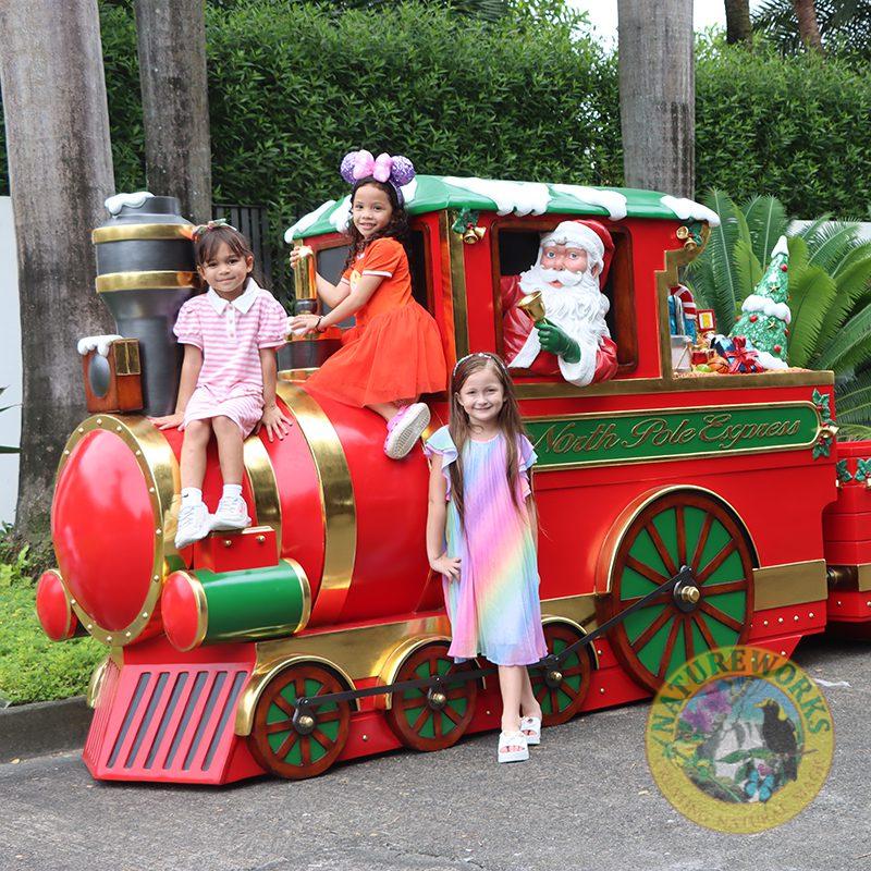 Christmas Train - "North Pole Express - 230090 - Shown outside with Santa and Children - V1