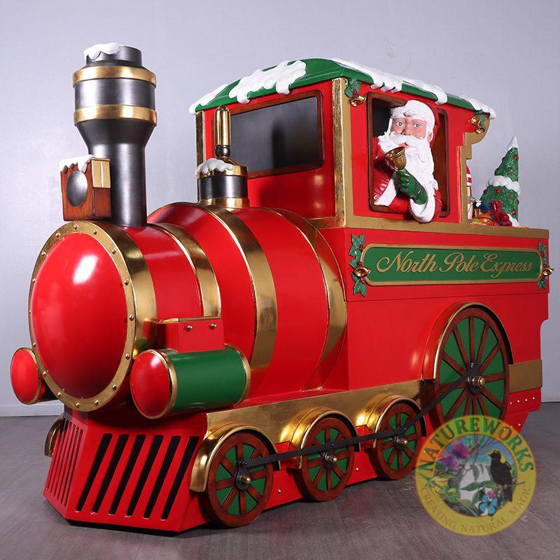 Natureworks Australia Christmas Train - "North Pole Express - 230090 - Shown at an angle with Santa leaning out of window.- V3