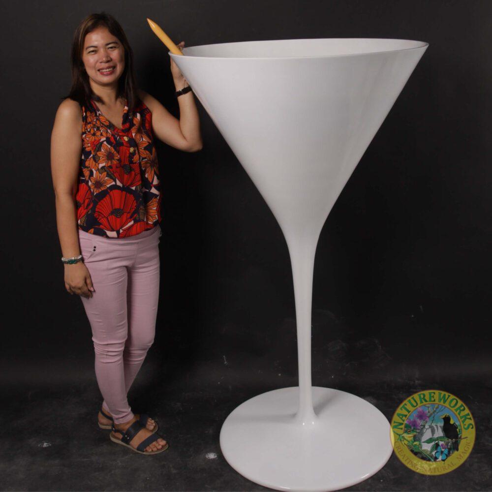 Natureworks Australia cocktail glass - 5ft - glossy white - window display visual merchanising prop - 170234- shown with lady